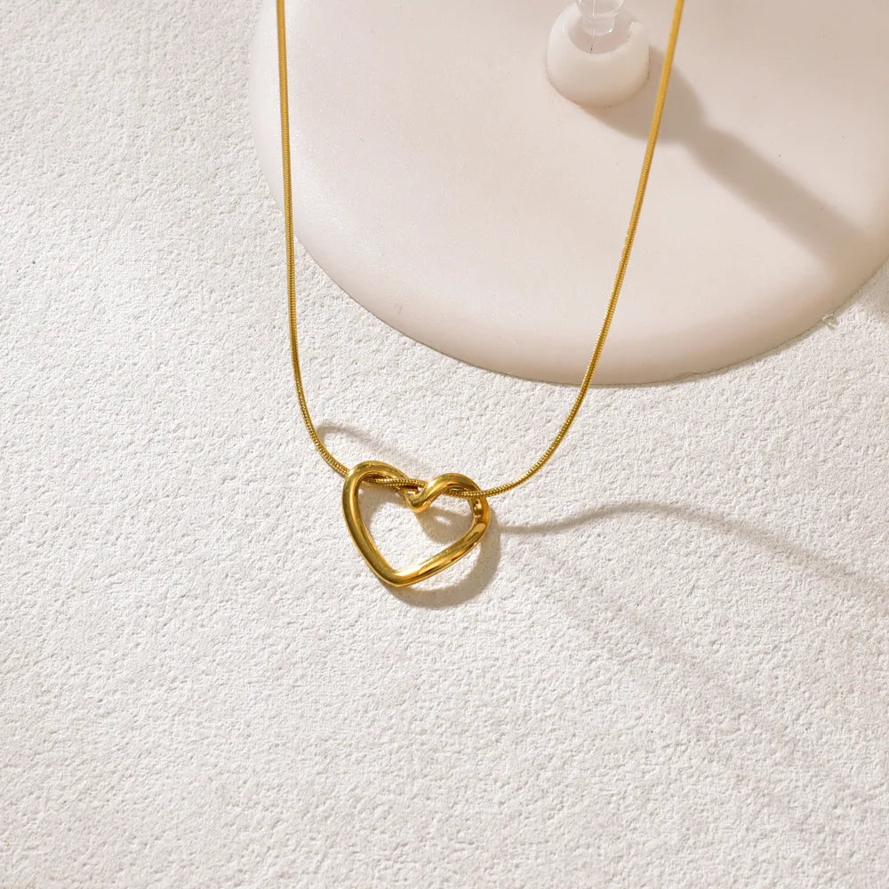 Light Luxury Hollow Heart Pendant Necklace — Titanium Steel, Minimalist Romantic Jewelry