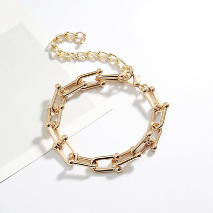 Horseshoe chain earrings piece