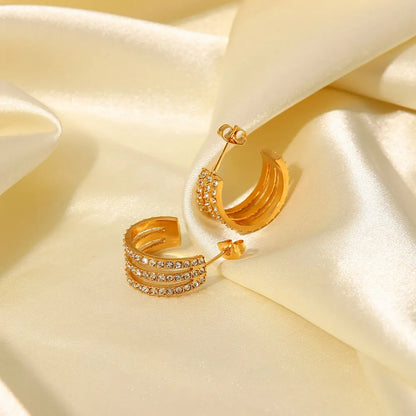Zircon C-hoop earrings worn on model