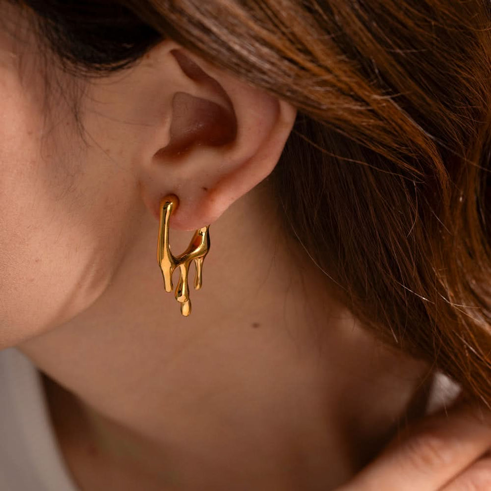 Drip earrings styled with outfit