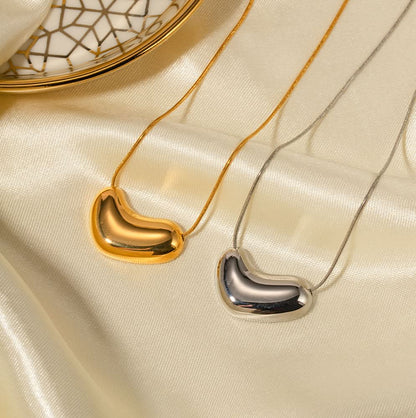 Bean pendant worn on model