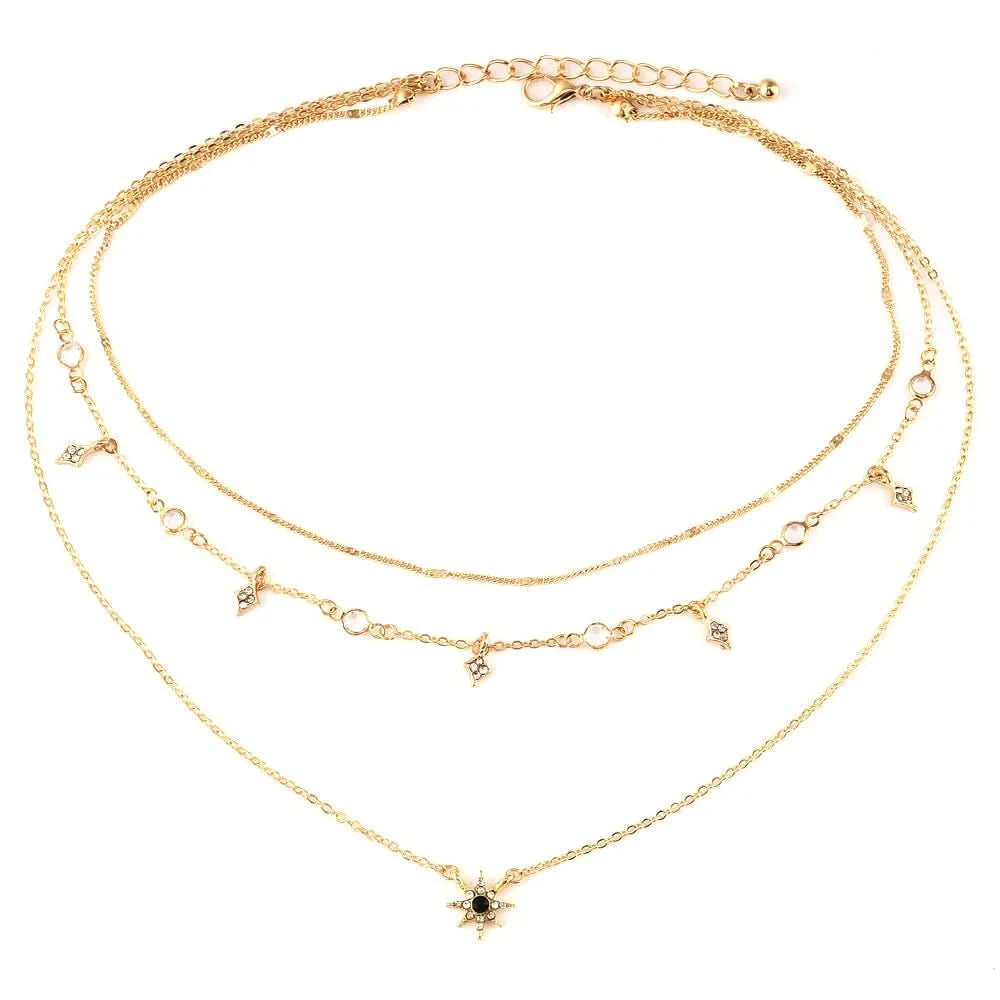 Star necklace worn on model