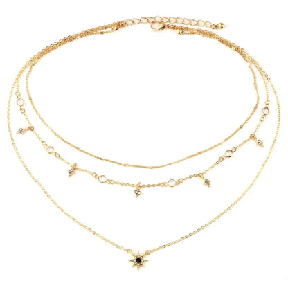 Star necklace worn on model