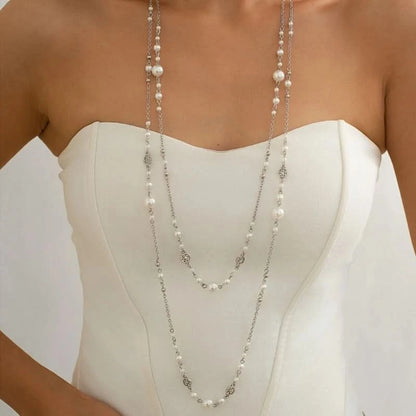 Pearl and gold chain layered styling detail