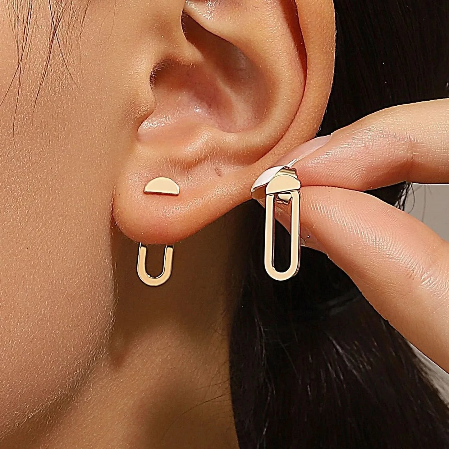 Geometric studs worn on model