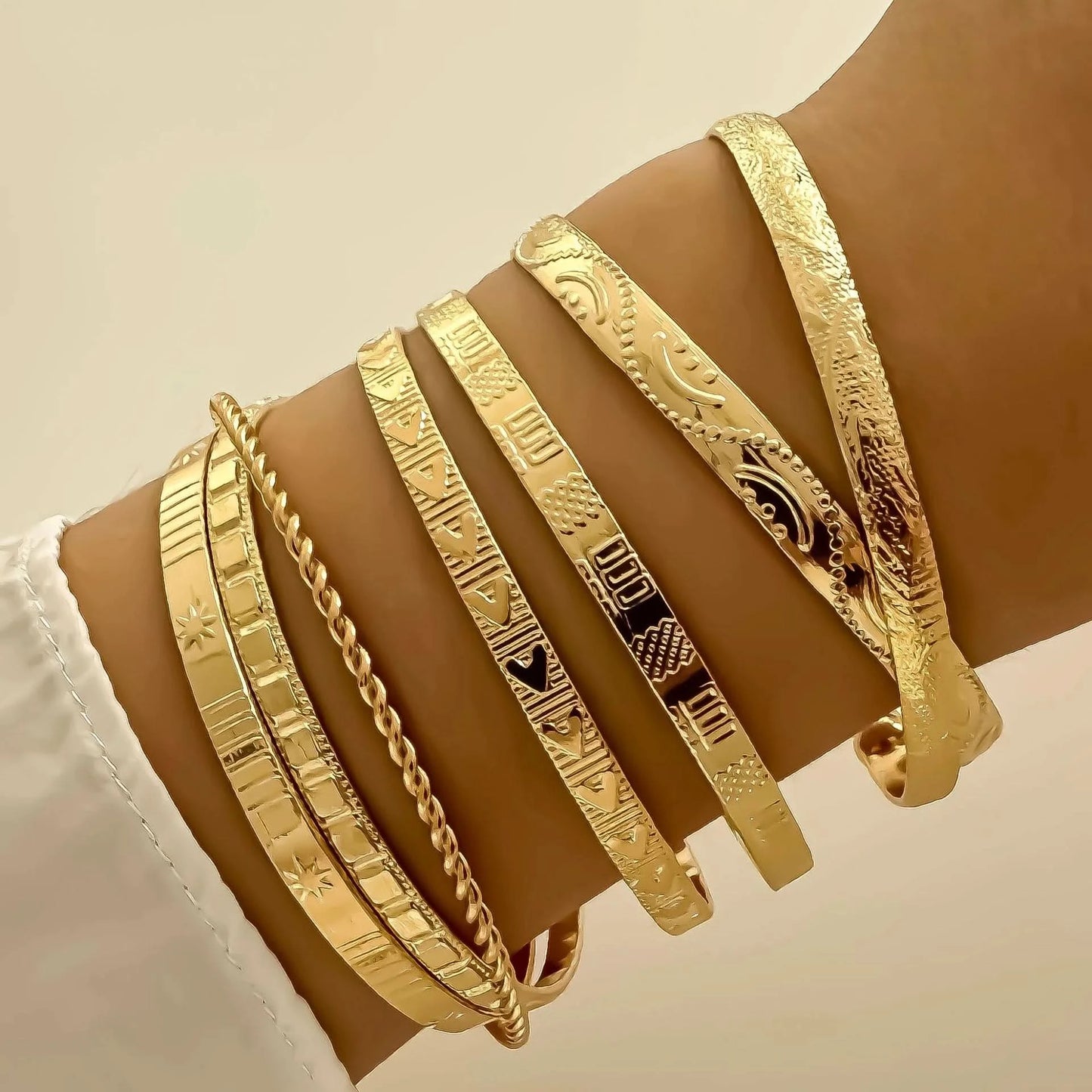 Bangle set in silver finish on wrist