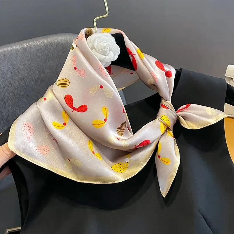 Silk scarf tied on handbag