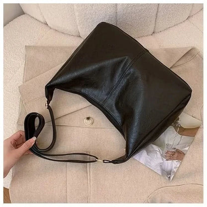 Hobo bag styled with blazer outfit
