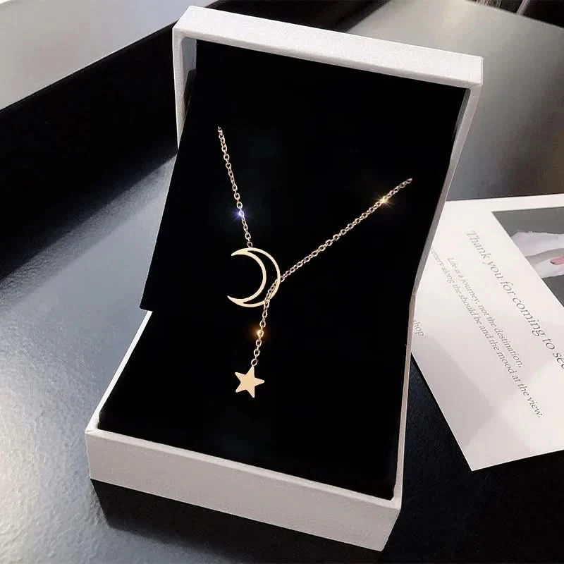 Crescent moon and star lariat necklace — main view