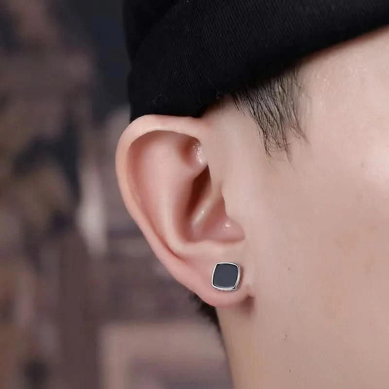 Stud hoop earrings styled in ear stack