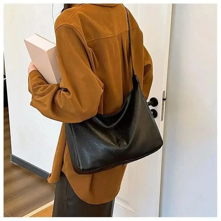 Hobo bag carried in hand