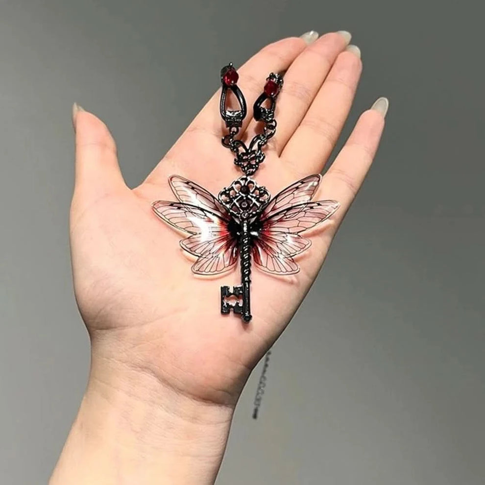 Dragonfly necklace worn on model