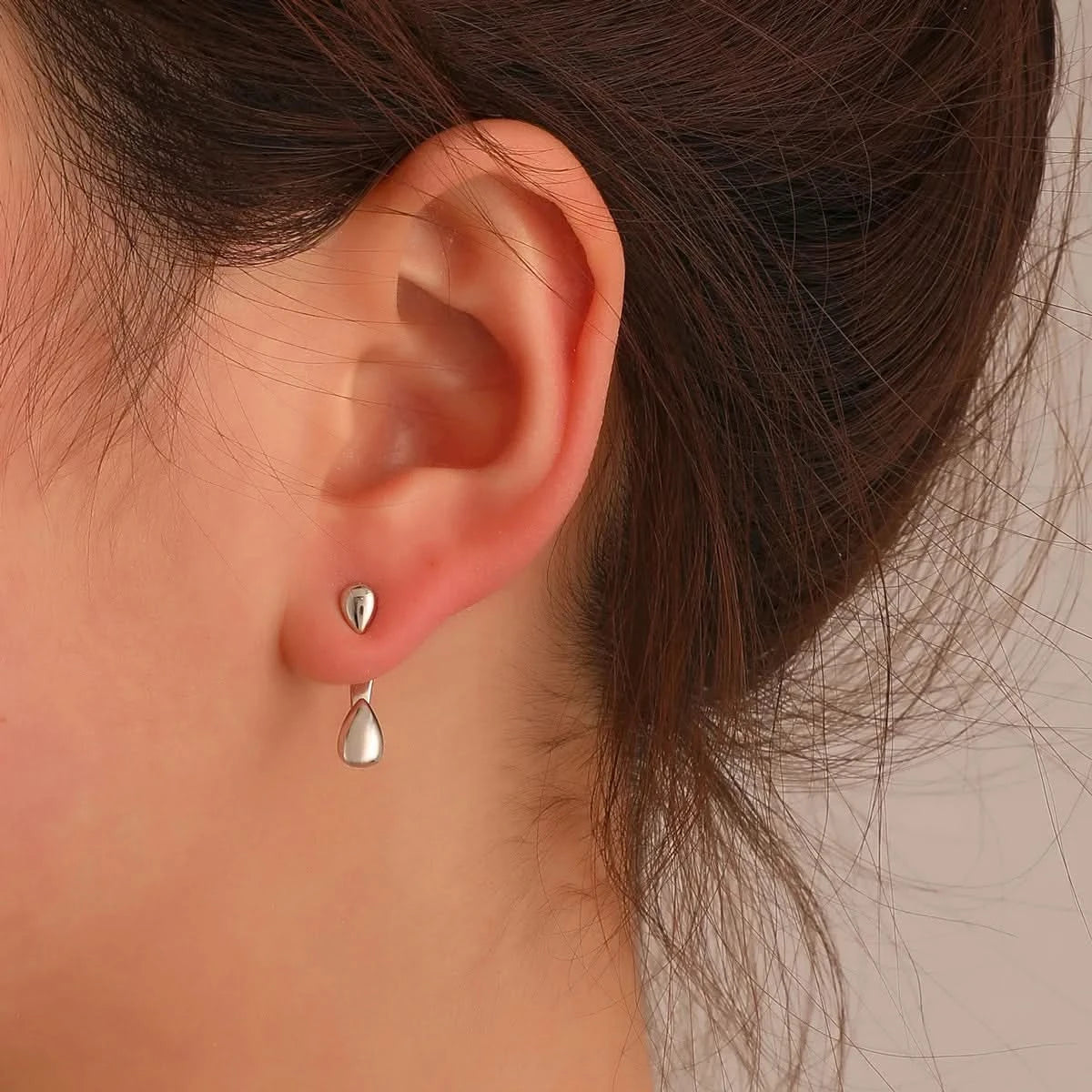 Geometric studs flat lay