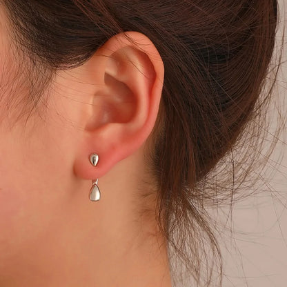 Geometric studs flat lay
