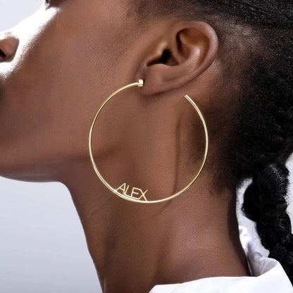 Custom name hoops worn on model