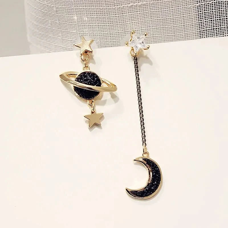 Sun moon earrings close-up showing crystal accents