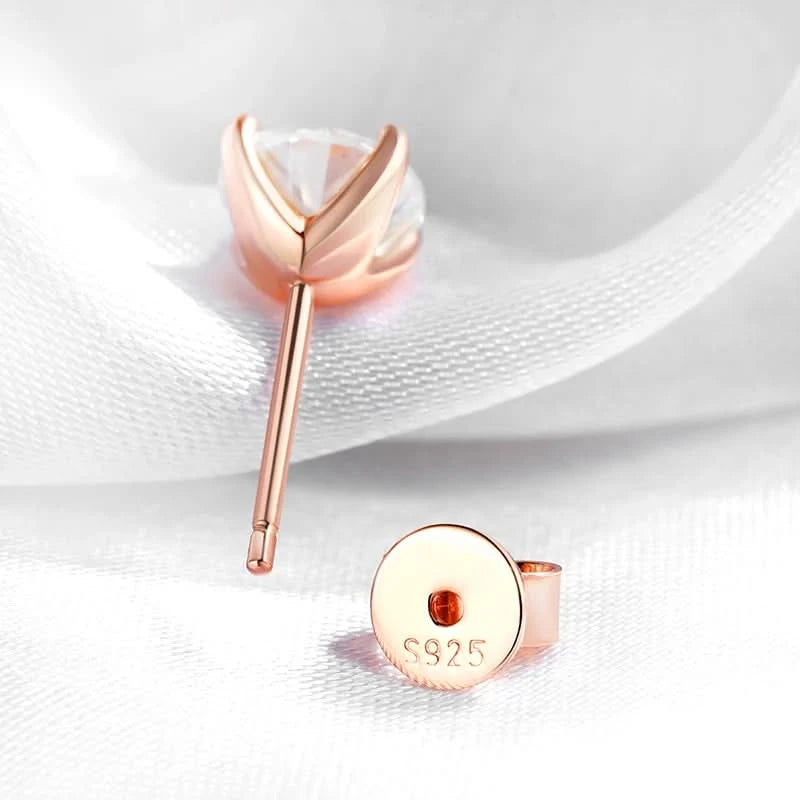 Moissanite stud earrings worn on model
