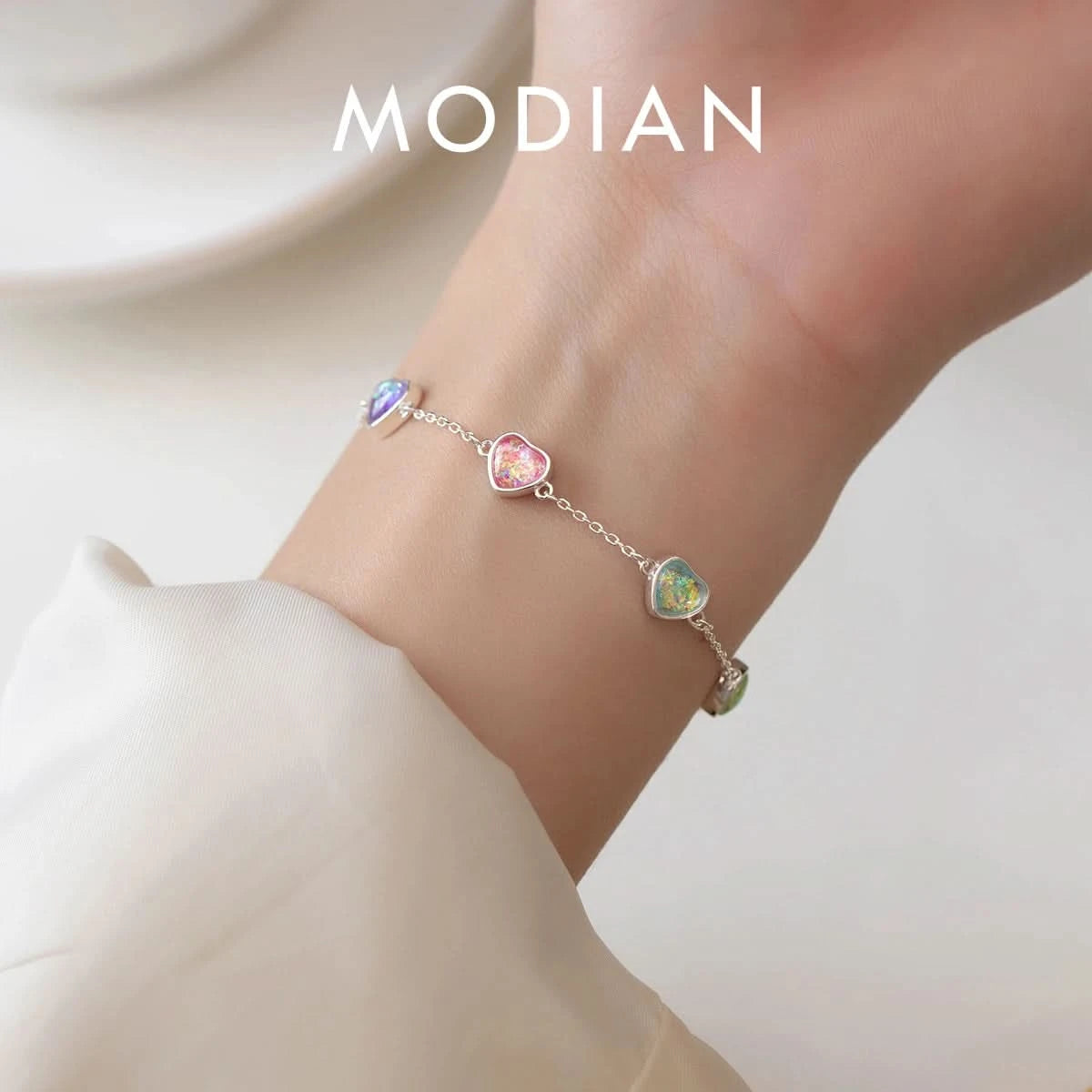 Rainbow heart charm bracelet — main view