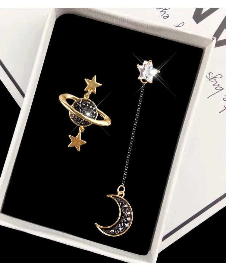 Sun and moon mismatched earring detail