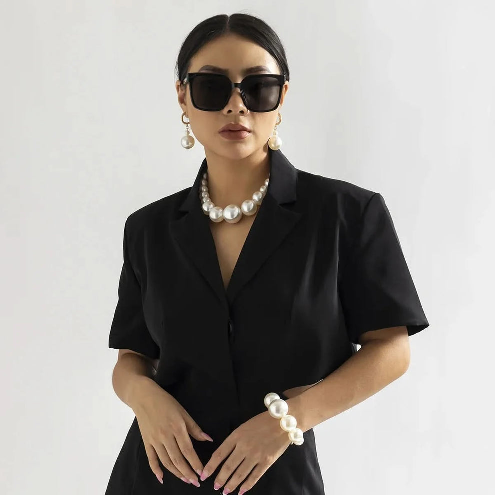 Choker and bracelet set worn together