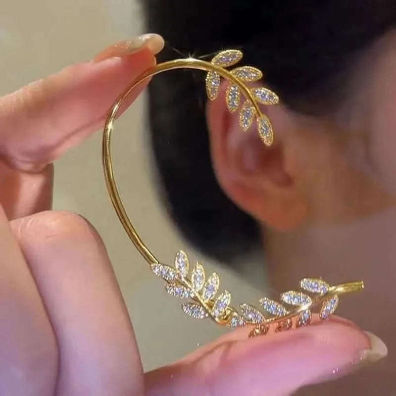 Leaf ear cuff close-up showing CZ stones