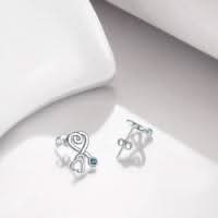 Nurse earrings worn on model